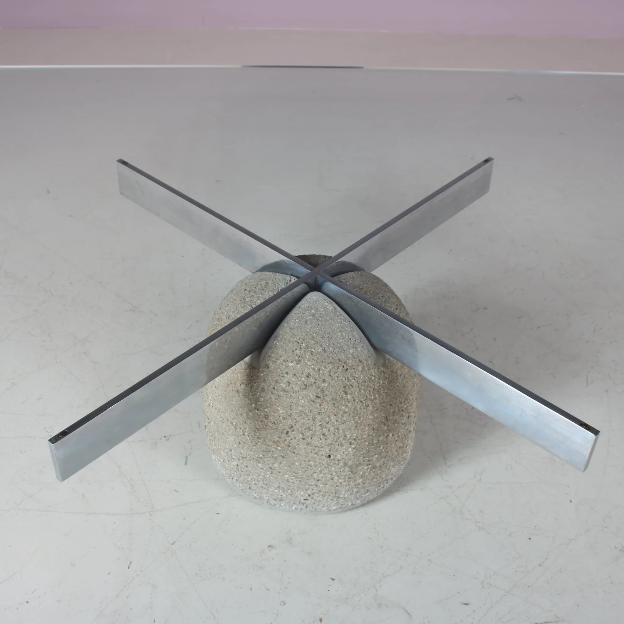 m27666 1970s "Paracarro" Coffee table on stone bse with chrome metal support and glass top / Giovanni Offredi / Saporiti, Italy