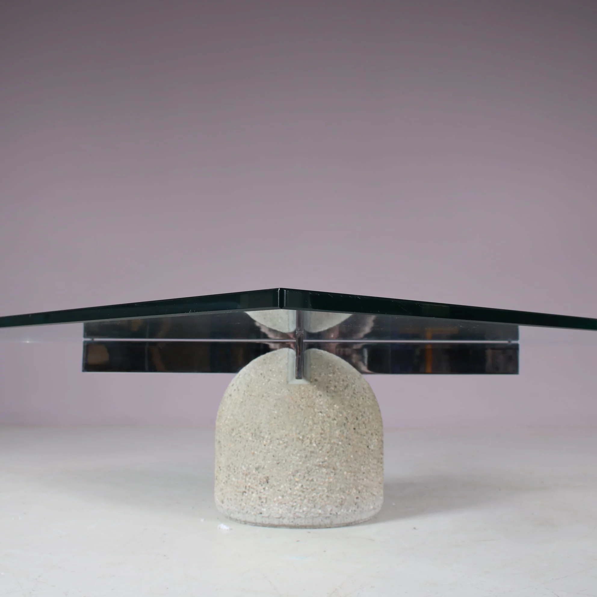 m27666 1970s "Paracarro" Coffee table on stone bse with chrome metal support and glass top / Giovanni Offredi / Saporiti, Italy