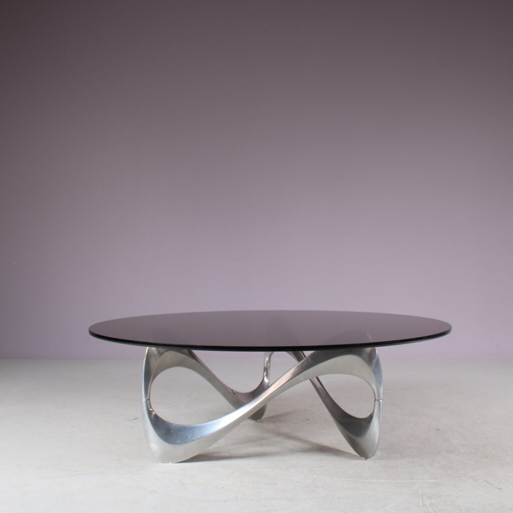 m27776 1960s "Snake" Coffee table in chrome with smoked glass top / Knut Hesterberg / Ronald Schmitt, Germany