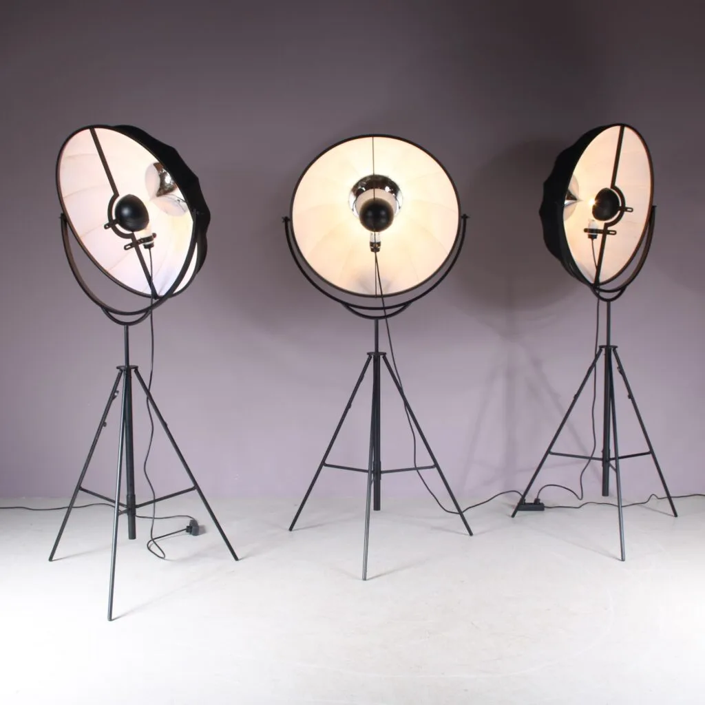 A very rare floor lamp, model “Postkrisi F 60”, manufactured by Cattelani & Smith in Italy around 1990. The piece has a minimalist, chrome plated metal base on a flat food and round matching dimmer. The eye-catching feauture of this piece is the unique fiberglass shade, Designed to play with the features of light and shape and doing so very successfully! The rough finish of the shade, with jagged and fringed edges, creates an appealing contrast to the clean frame. This combines into a unique structure of this very rare piece! All together it makes a true statement piece for the interior, guarateed to draw the attention while also adding a nice (and dimmable) light to the decor. Adjustable in height from 200 to 250 cm. The piece is signed on the dimmer as shown in photos. It remains in very good, vintage condition with minor wear consistent with age and use, preserving a beautiful patina.